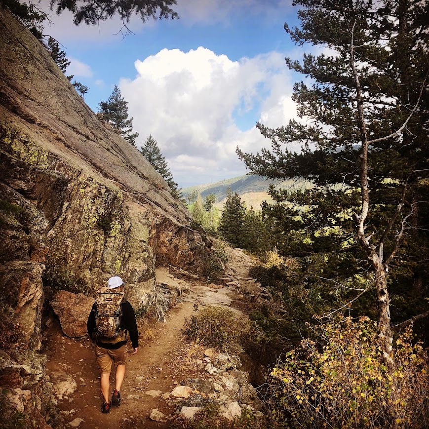 Hiker on a Colorado mountain trail